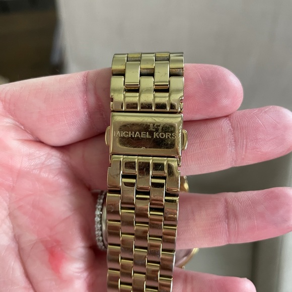 Gold Michael Kors watch with rhinestones